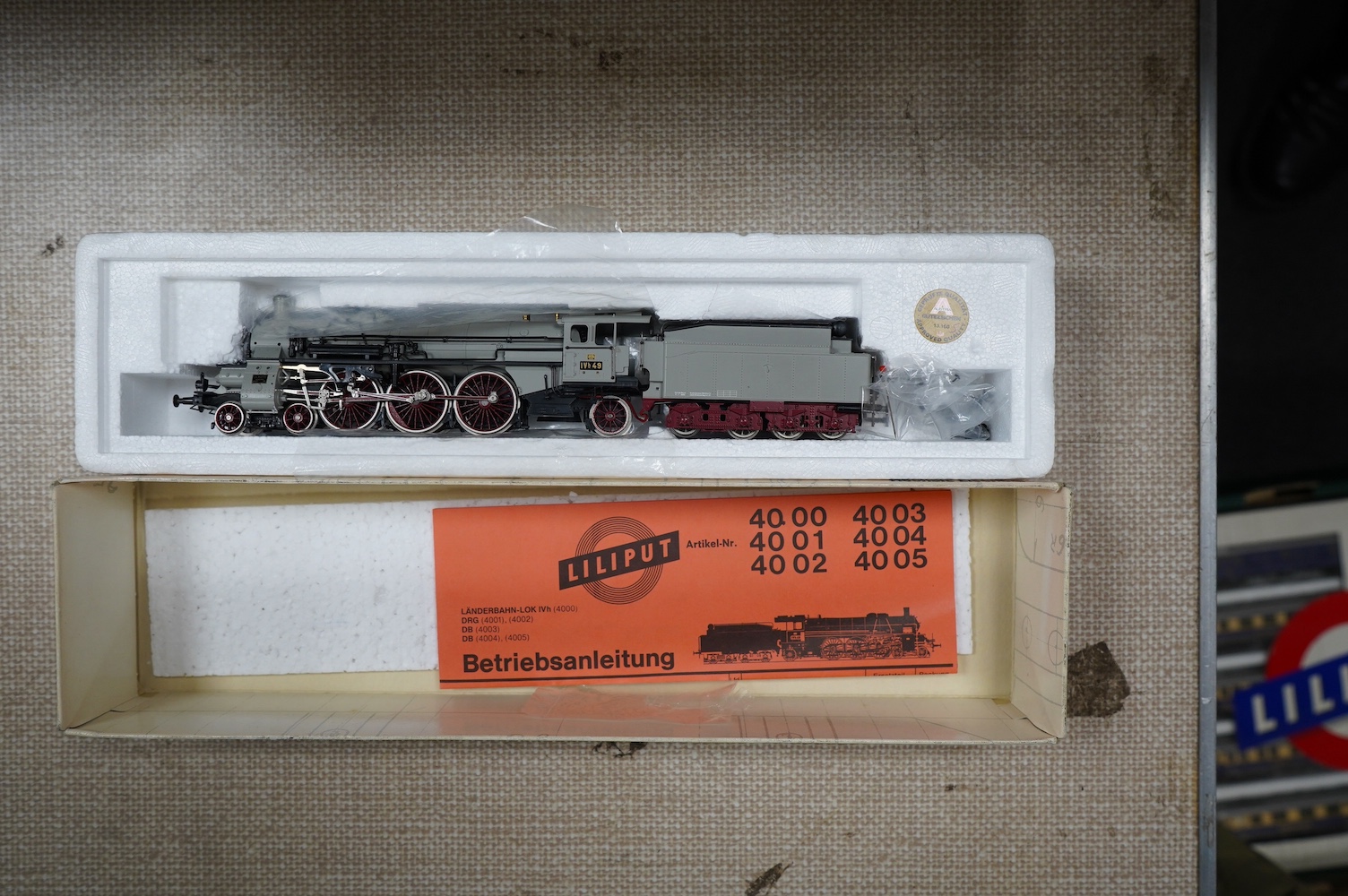 Two boxed Fleischmann HO gauge German passenger train sets, both comprising of a tender locomotive and bogie coaches (4885 and 4894), together with a Liliput 4-6-2 locomotive (4001) and a DR Rhinegold coach set (820), (4